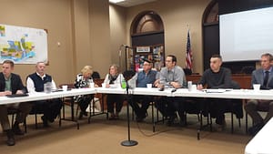 Members of the Lowell Light & Power board listen to citizen comments during Thursday's joint meeting.